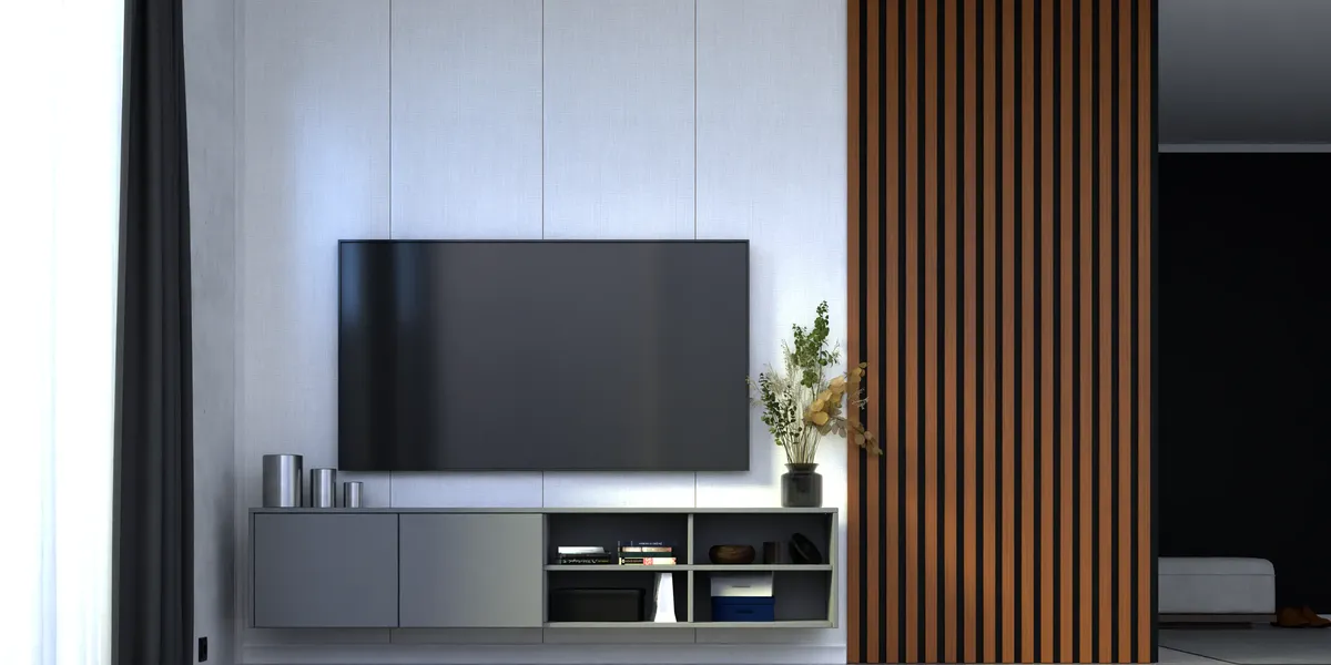 A TV wall in pale upholstered panels and slats in an oak finish